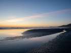 Sunset over beach and stream on a beach, Olympic Peninsula, Washington State. Art Print